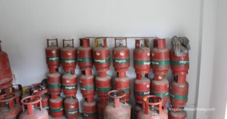 Stacked LPG cylinders at a gas agency in Zunheboto showing reliable LPG supply for local households.