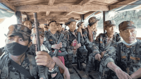 Retaliatory Strike Reported on NSCN-YA Camp in Myanmar Armed Naga Army personnel travelling together in a wooden vehicle in a forested area of Myanmar.